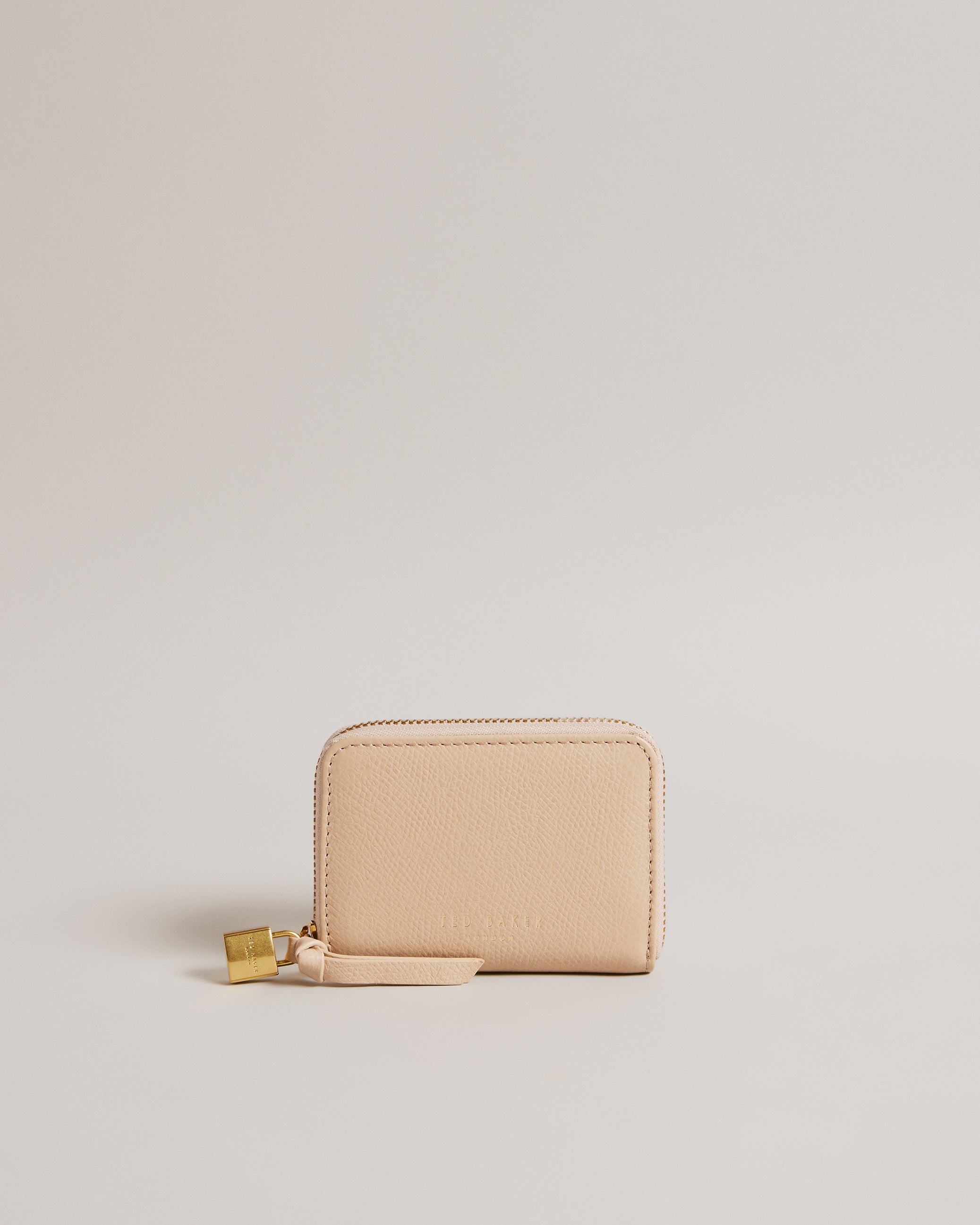 ويسمين محفظة جلدية صغيرة بقفل