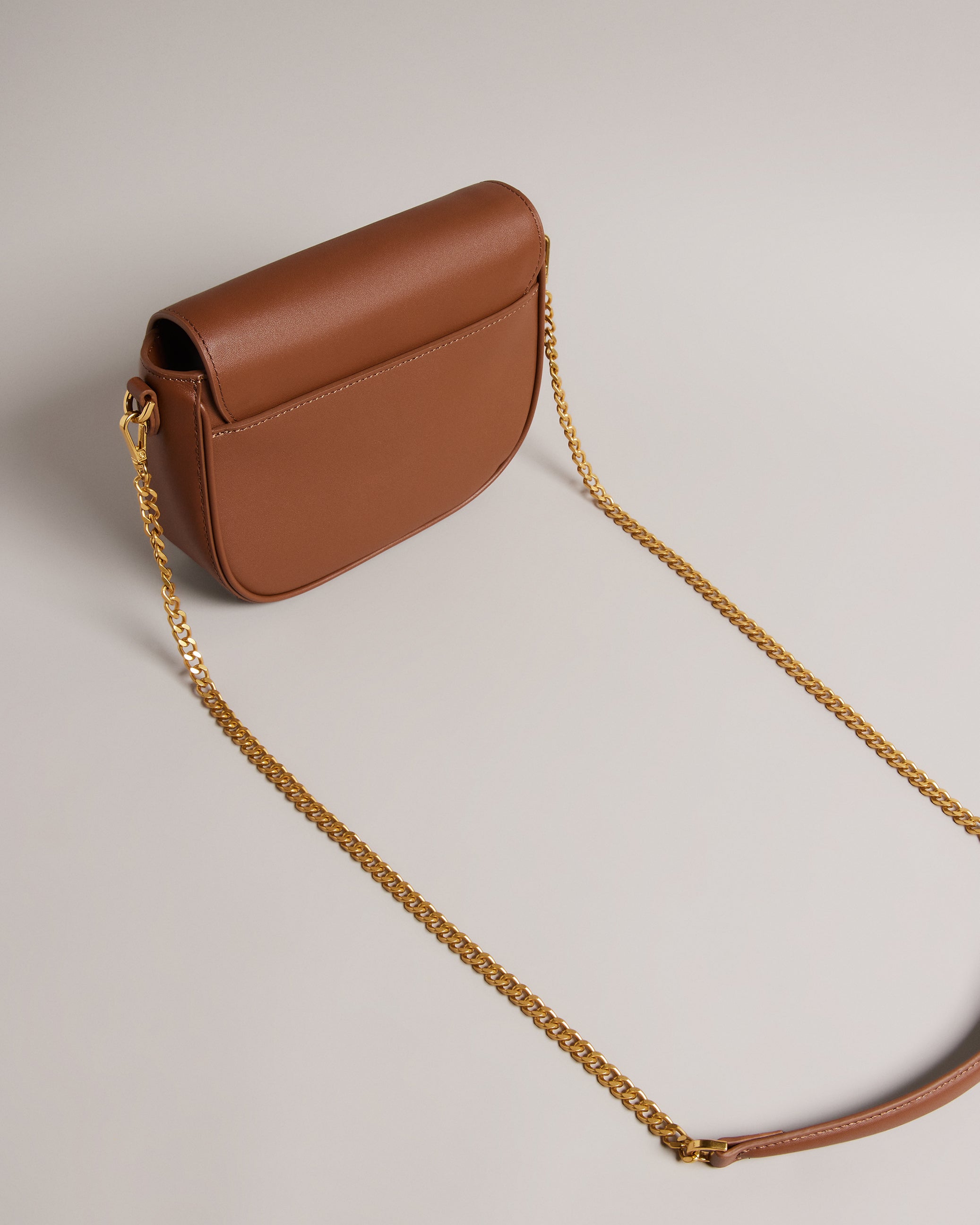 Esia Webbing Crossbody Saddle Bag Brown