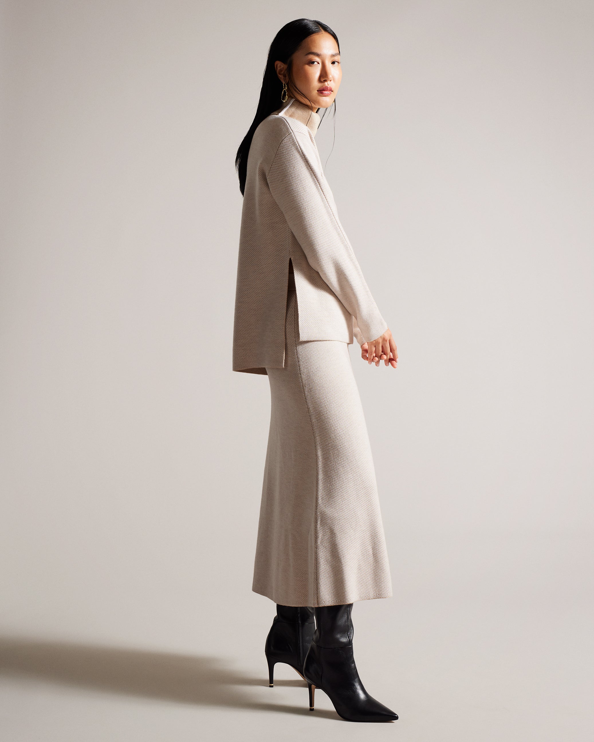 Lidyaaa Relaxed Fit Funnel Neck Jumper