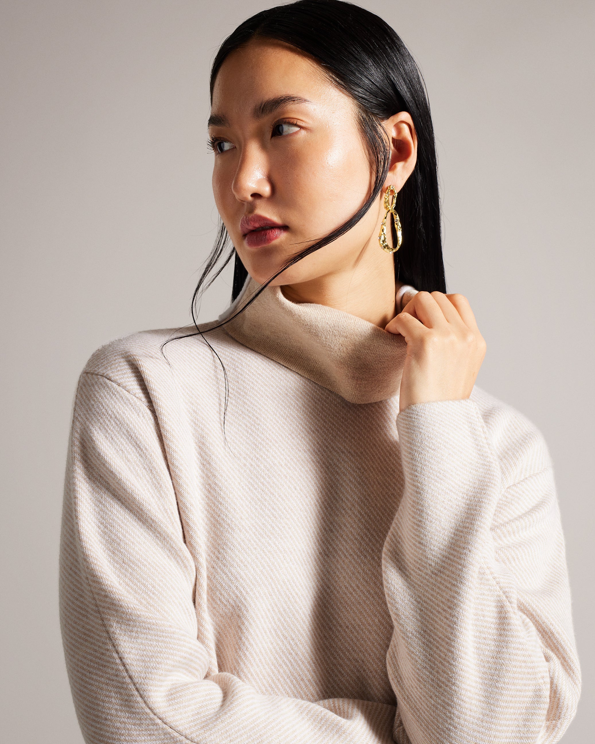 Lidyaaa Relaxed Fit Funnel Neck Jumper
