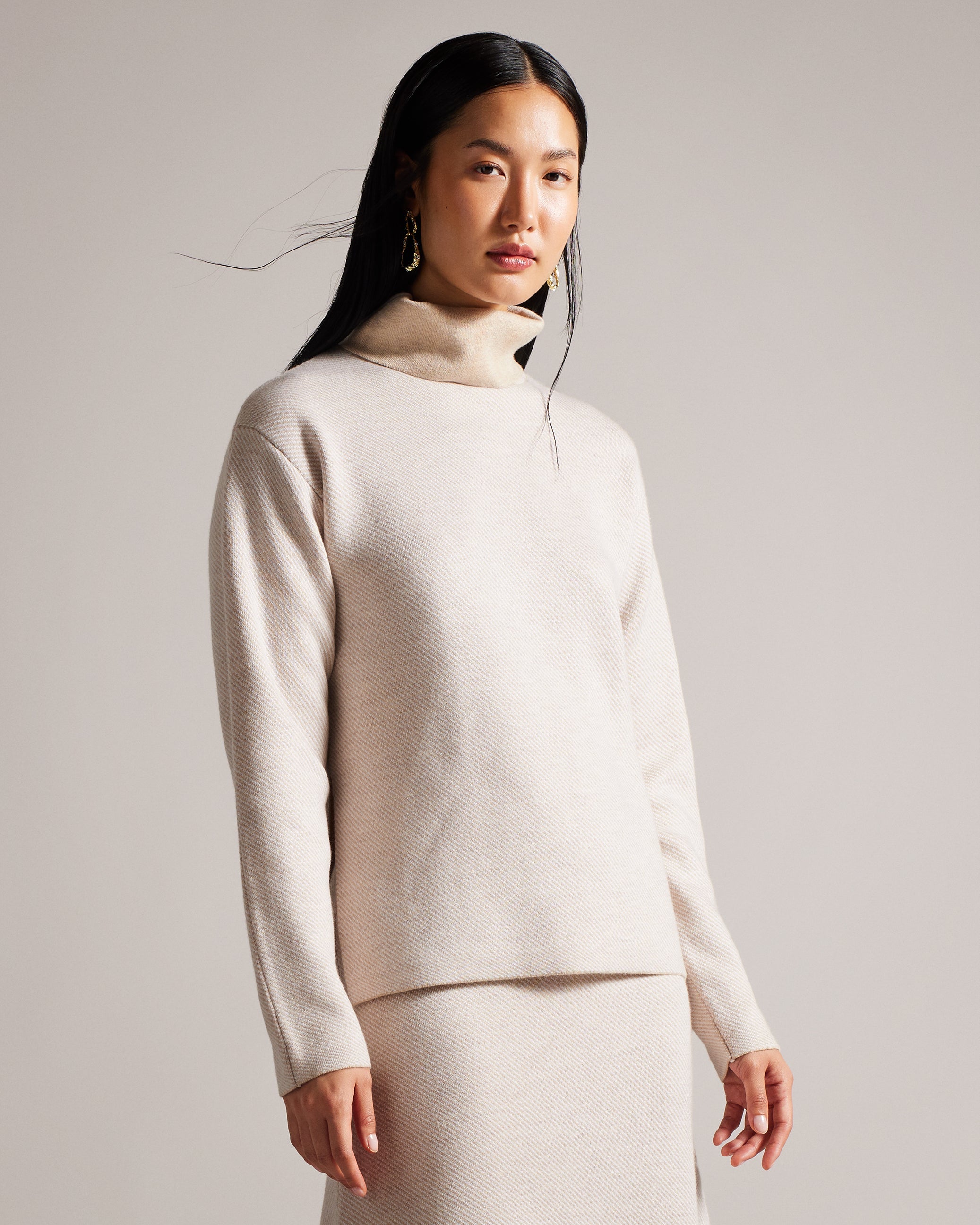 Lidyaaa Relaxed Fit Funnel Neck Jumper