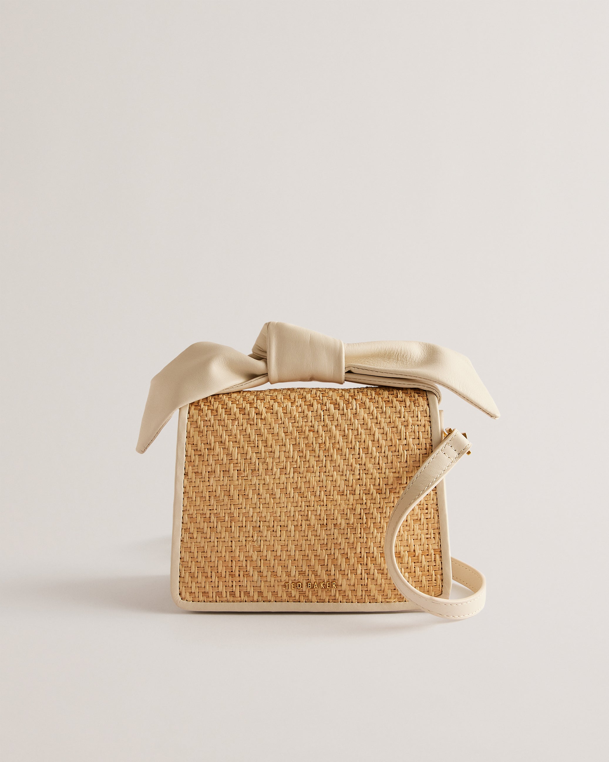 Niyahna Knot Bow Woven Mini Crossbody Bag Ivory