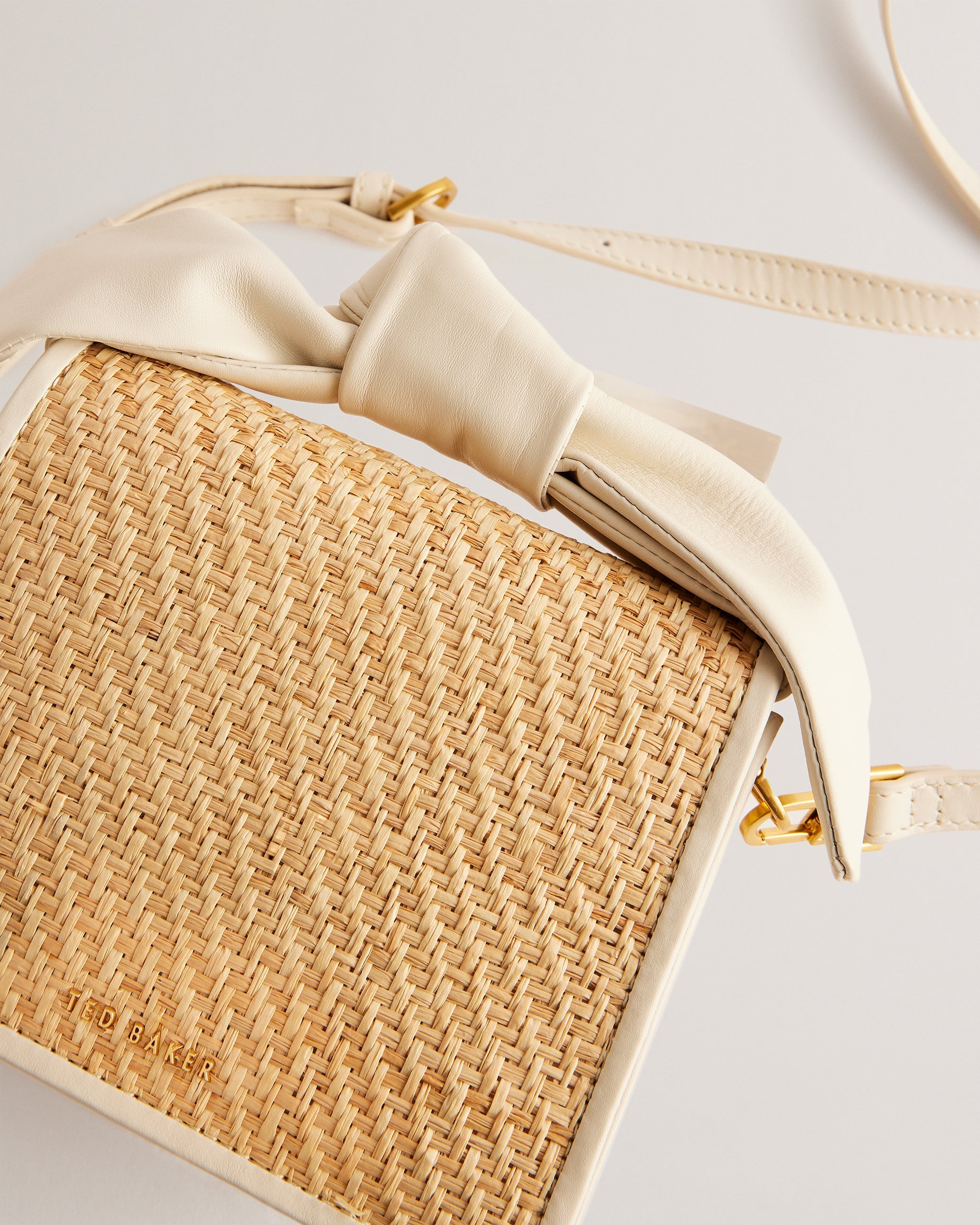 Niyahna Knot Bow Woven Mini Crossbody Bag Ivory