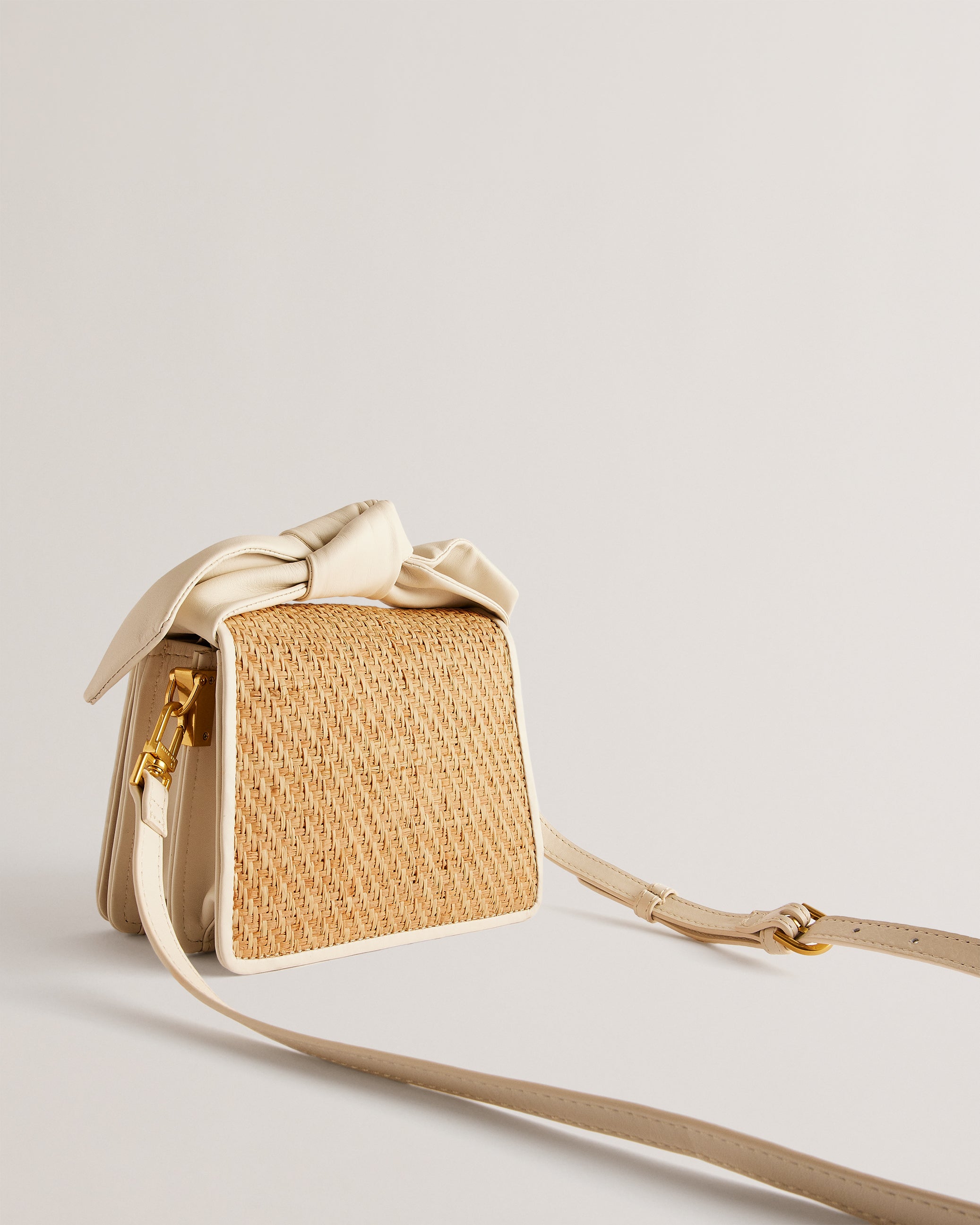 Niyahna Knot Bow Woven Mini Crossbody Bag Ivory