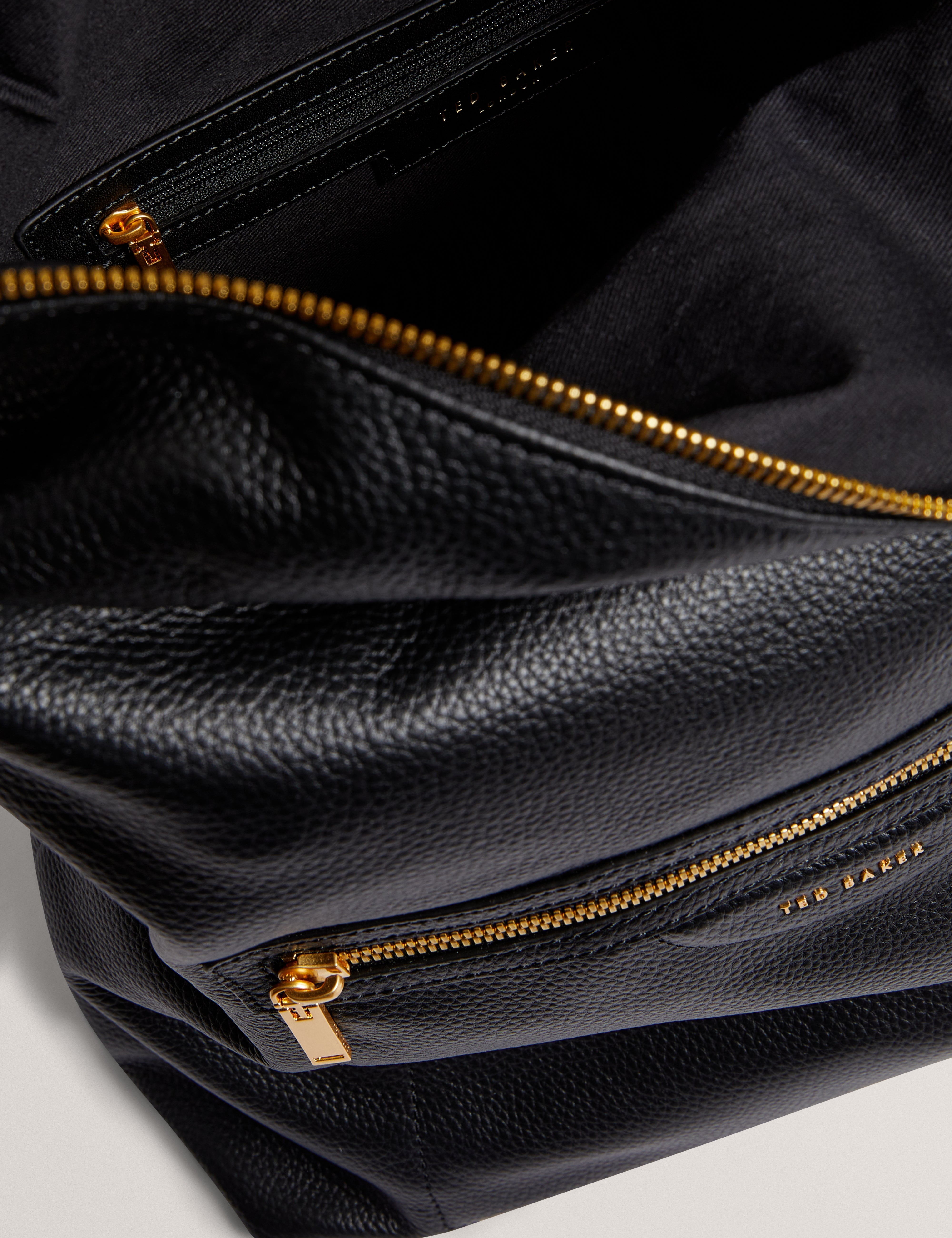 Essaya Pebbled Leather Fold Over Backpack Black