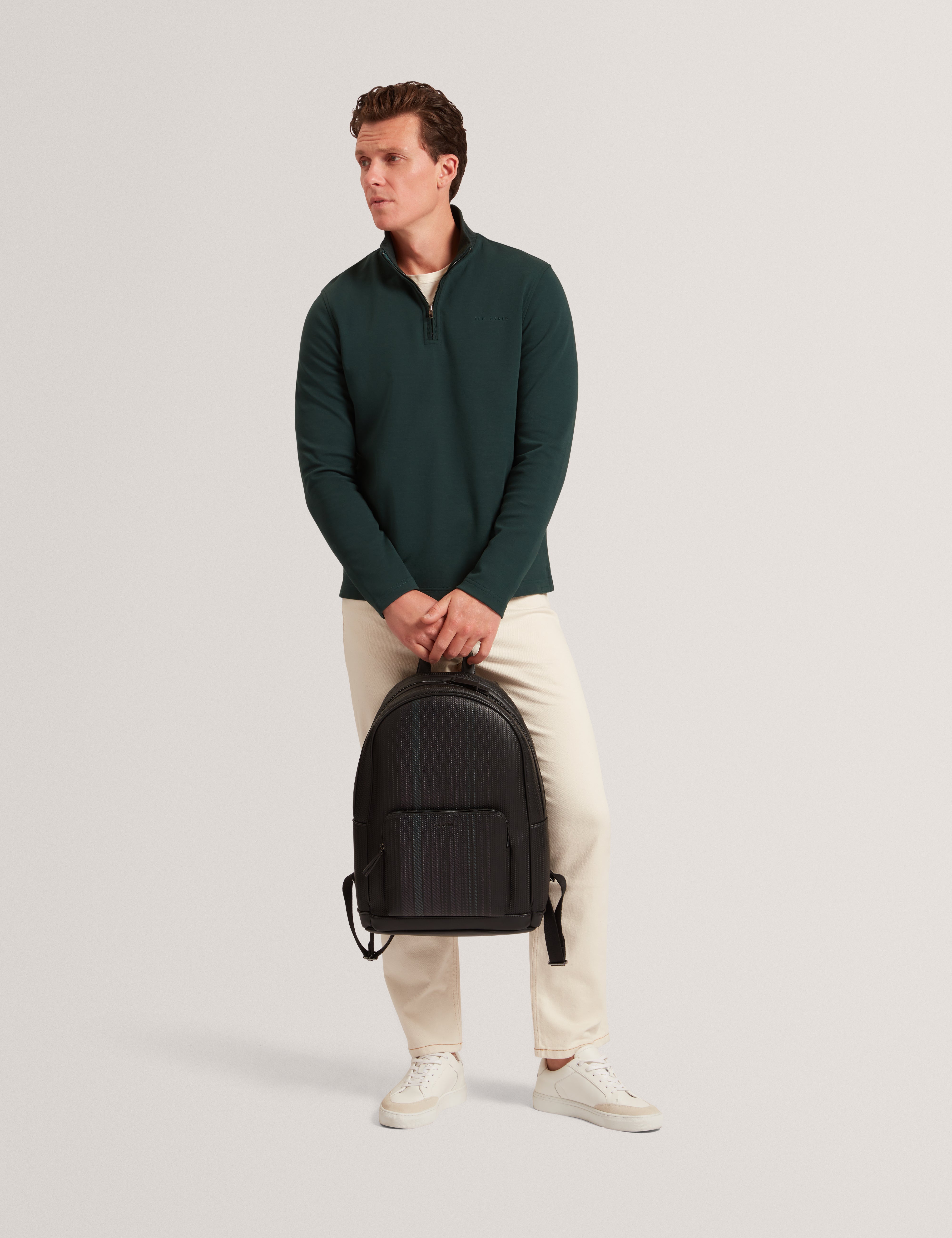 سحاب نصف دائري من ماركة كرابتر مع حافة قرص العسل - أخضر داكن