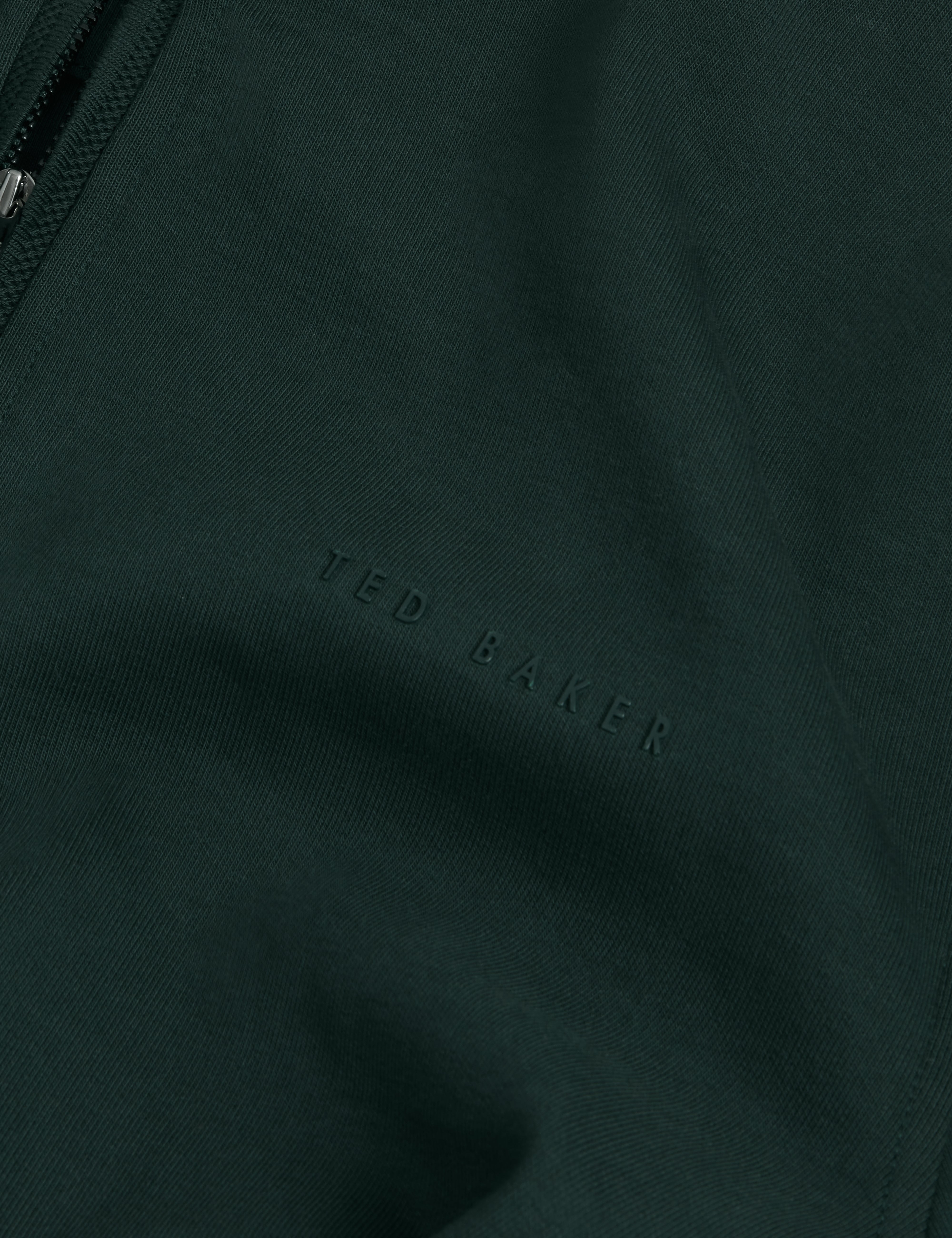 سحاب نصف دائري من ماركة كرابتر مع حافة قرص العسل - أخضر داكن