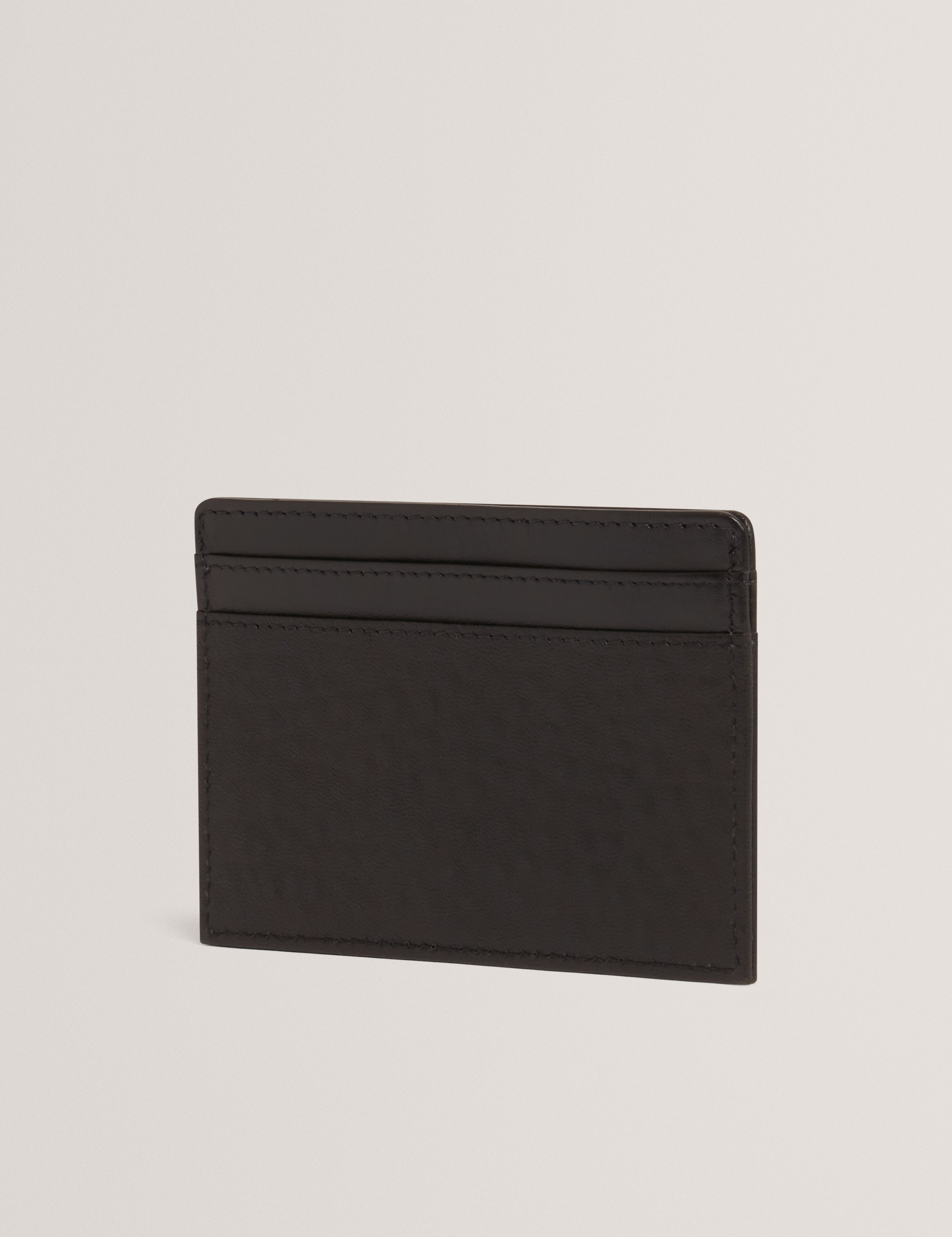 بيترز حامل بطاقات من الجلد باللون الأسود