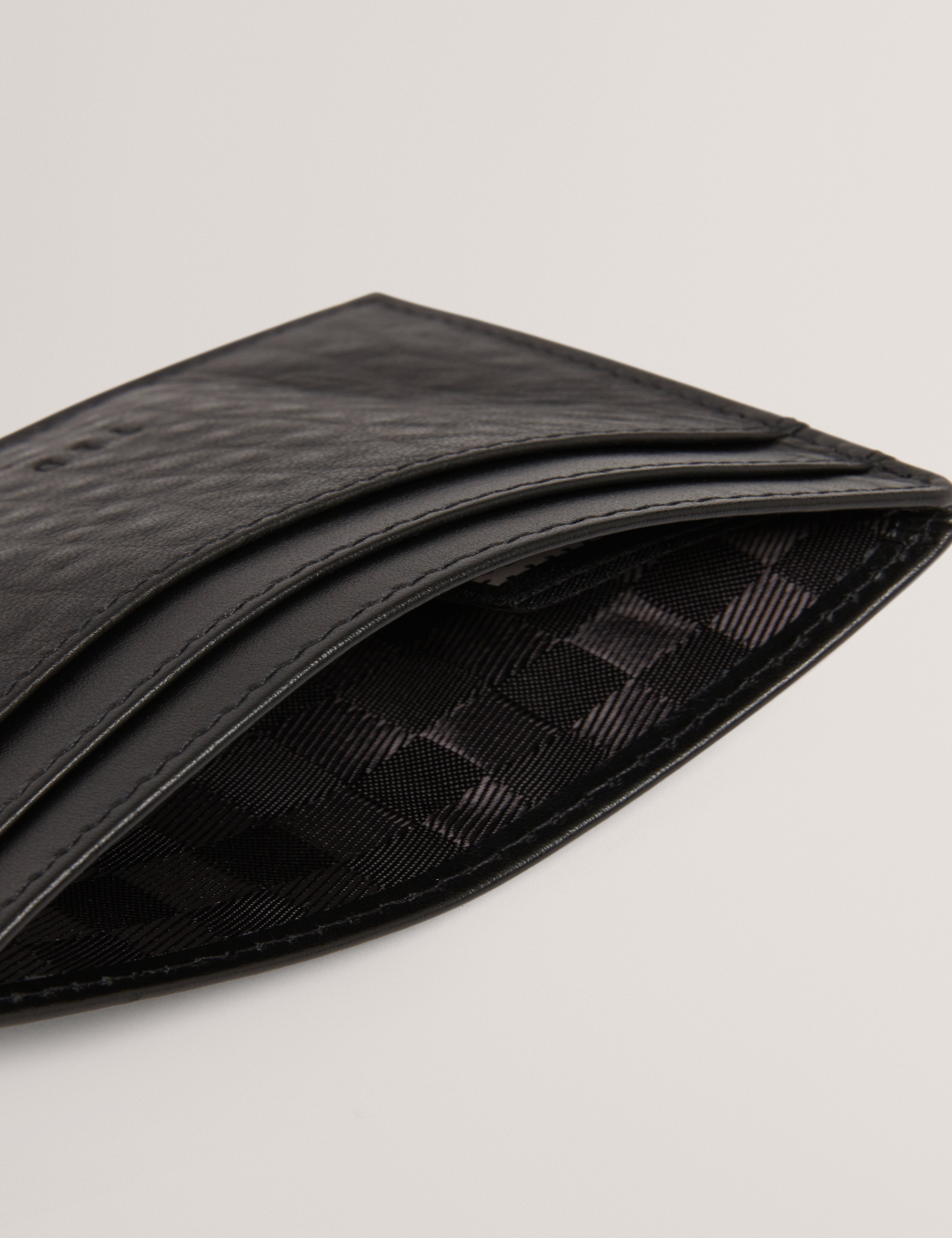 بيترز حامل بطاقات من الجلد باللون الأسود