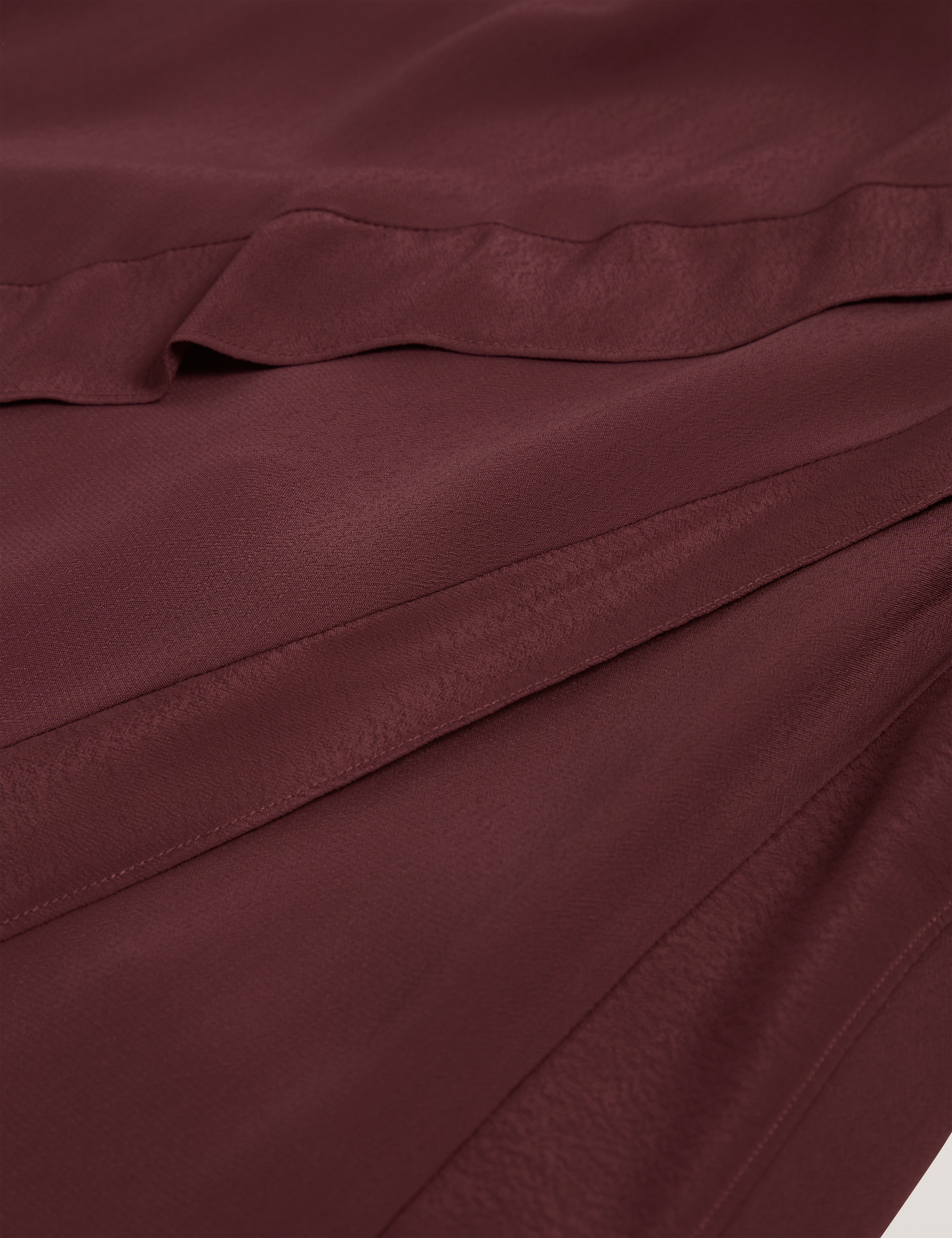 تيلدا تنورة ماكسي باللون الأحمر الداكن