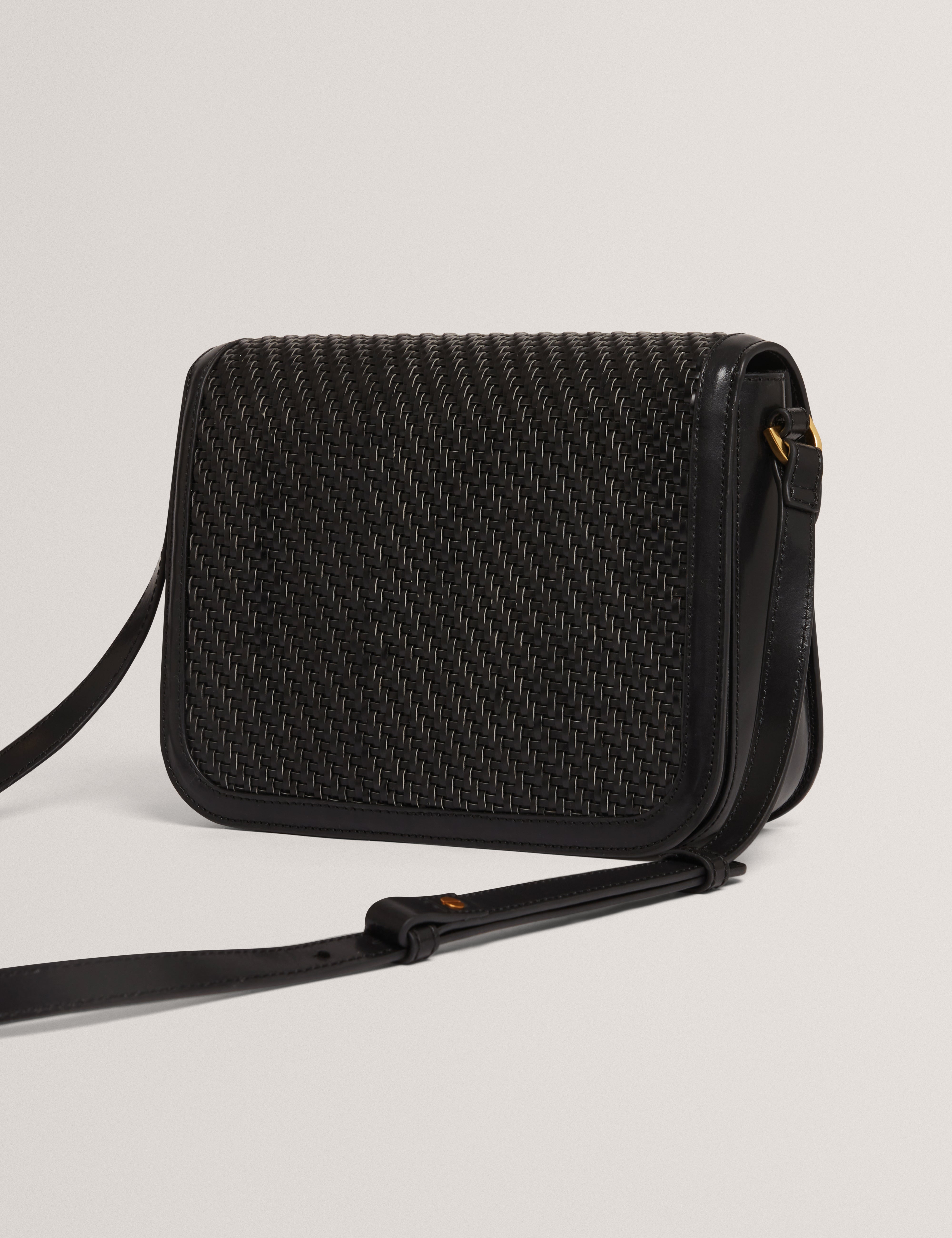 وارنر حقيبة سوداء بنمط منسوج مع قفل