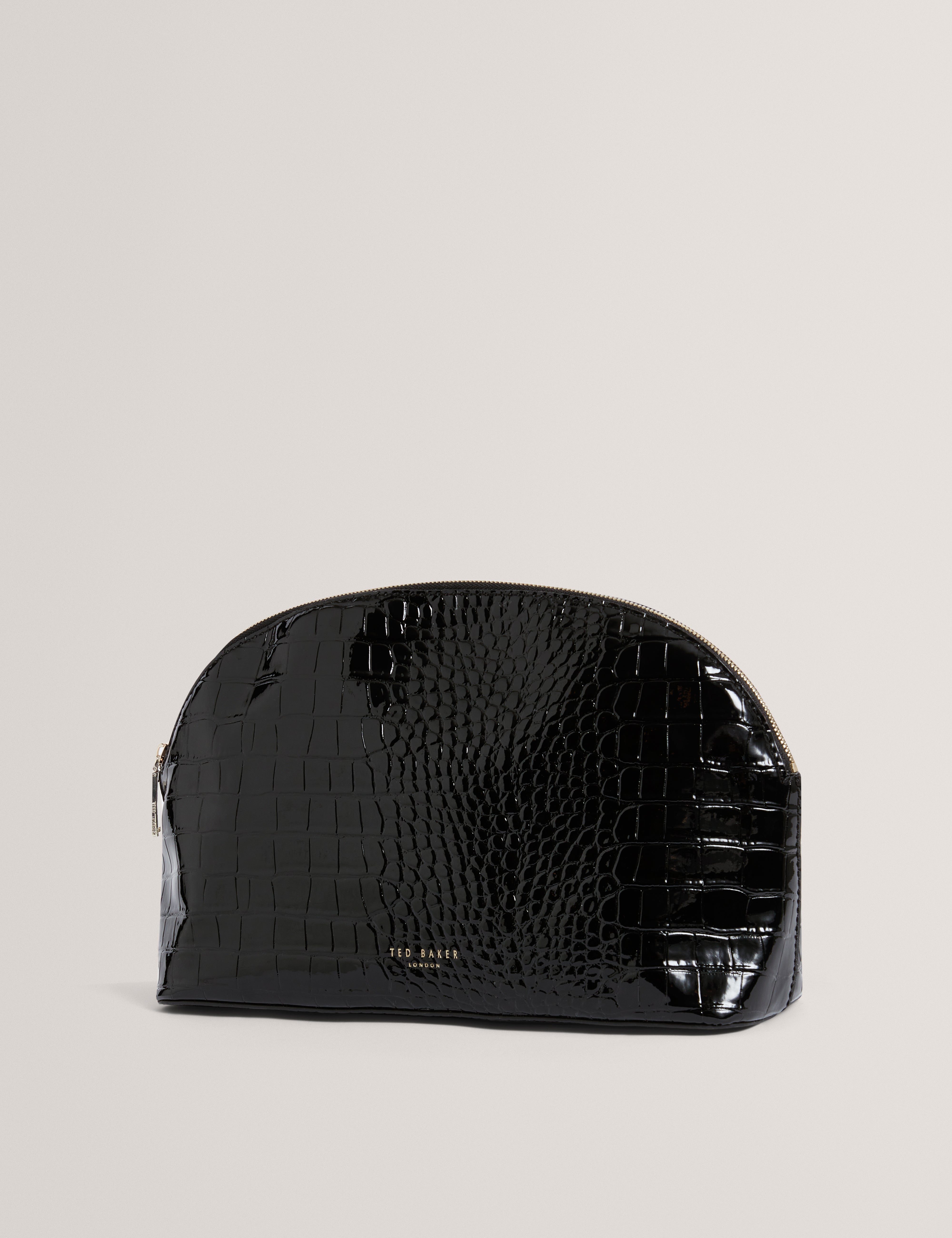 فالوريس حقيبة مستلزمات شخصية سوداء بنقشة جلد التمساح