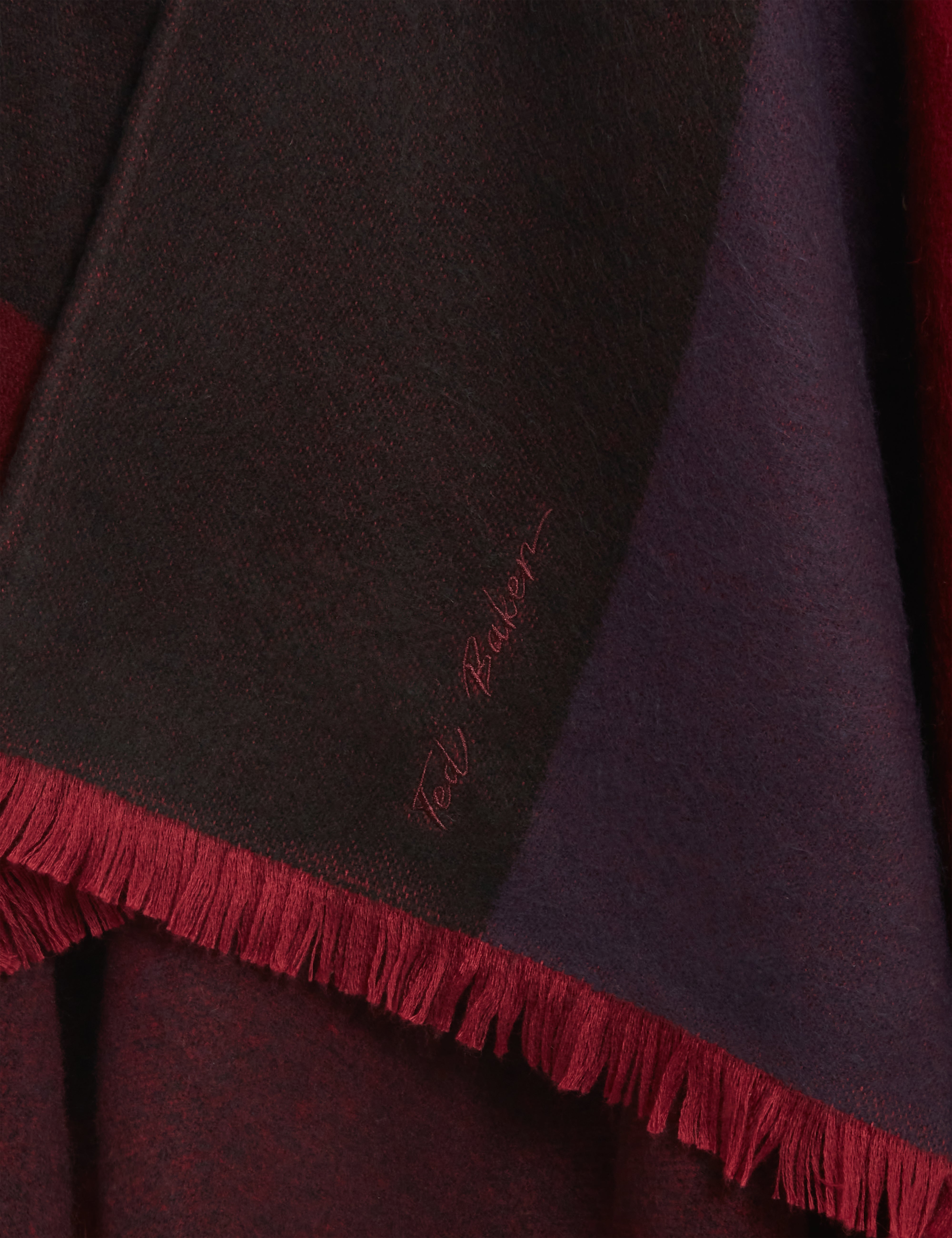 معطف بونشو سفيّا مزود بإبزيم، لون أحمر داكن.