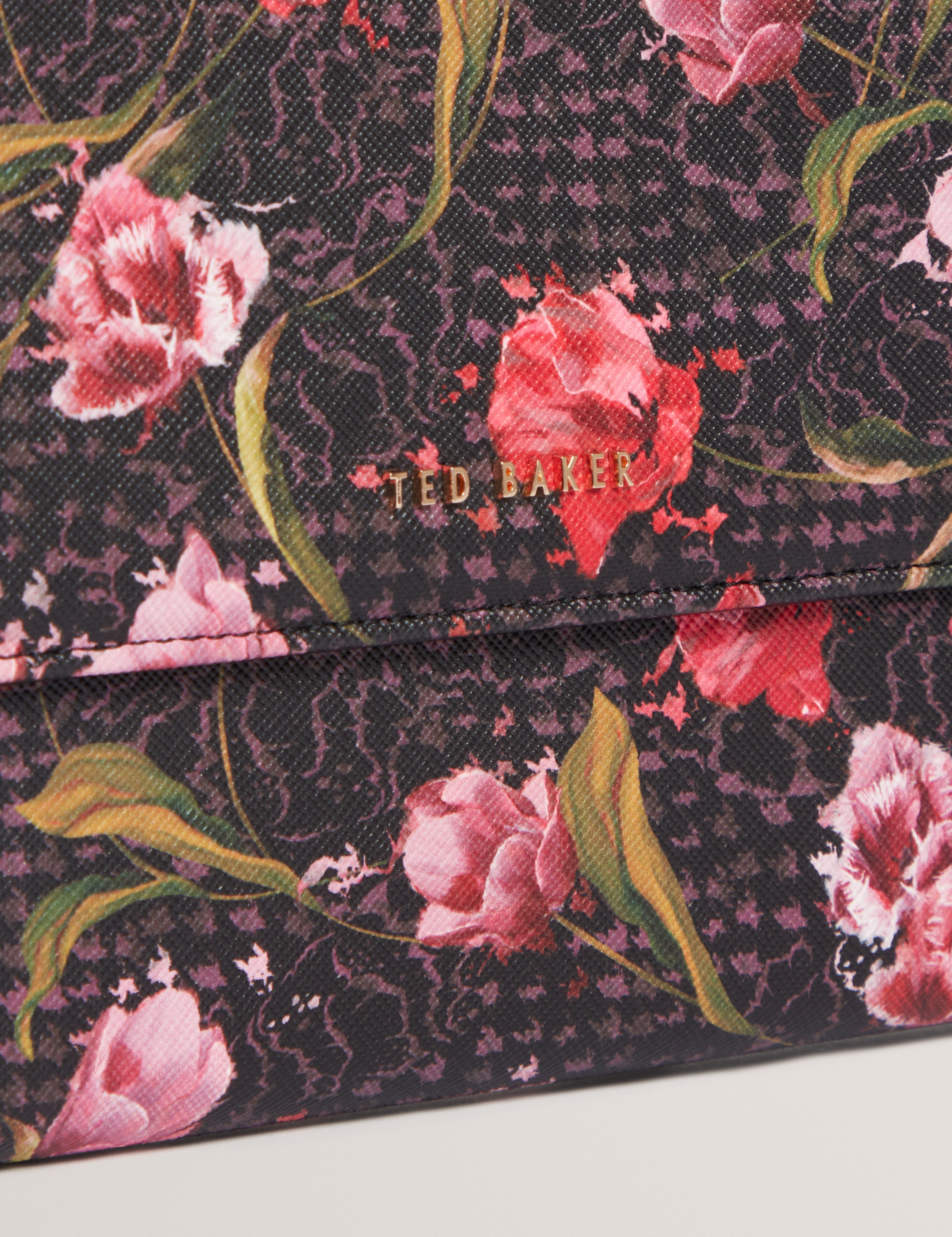 محفظة سفر مطبوعة من تولبري باللون الأسود