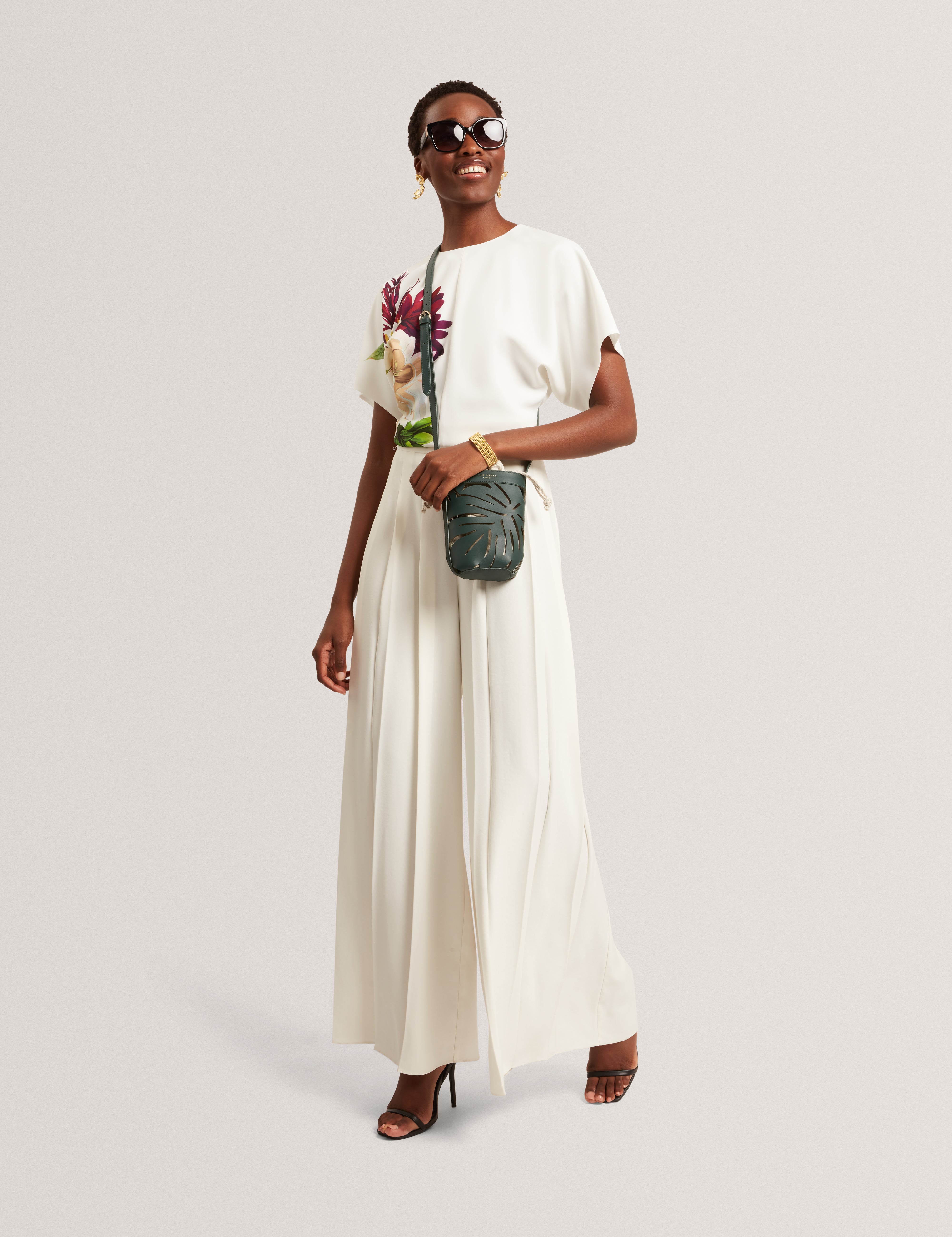 زوفيا كنزة بخصر محدد لون عاجي