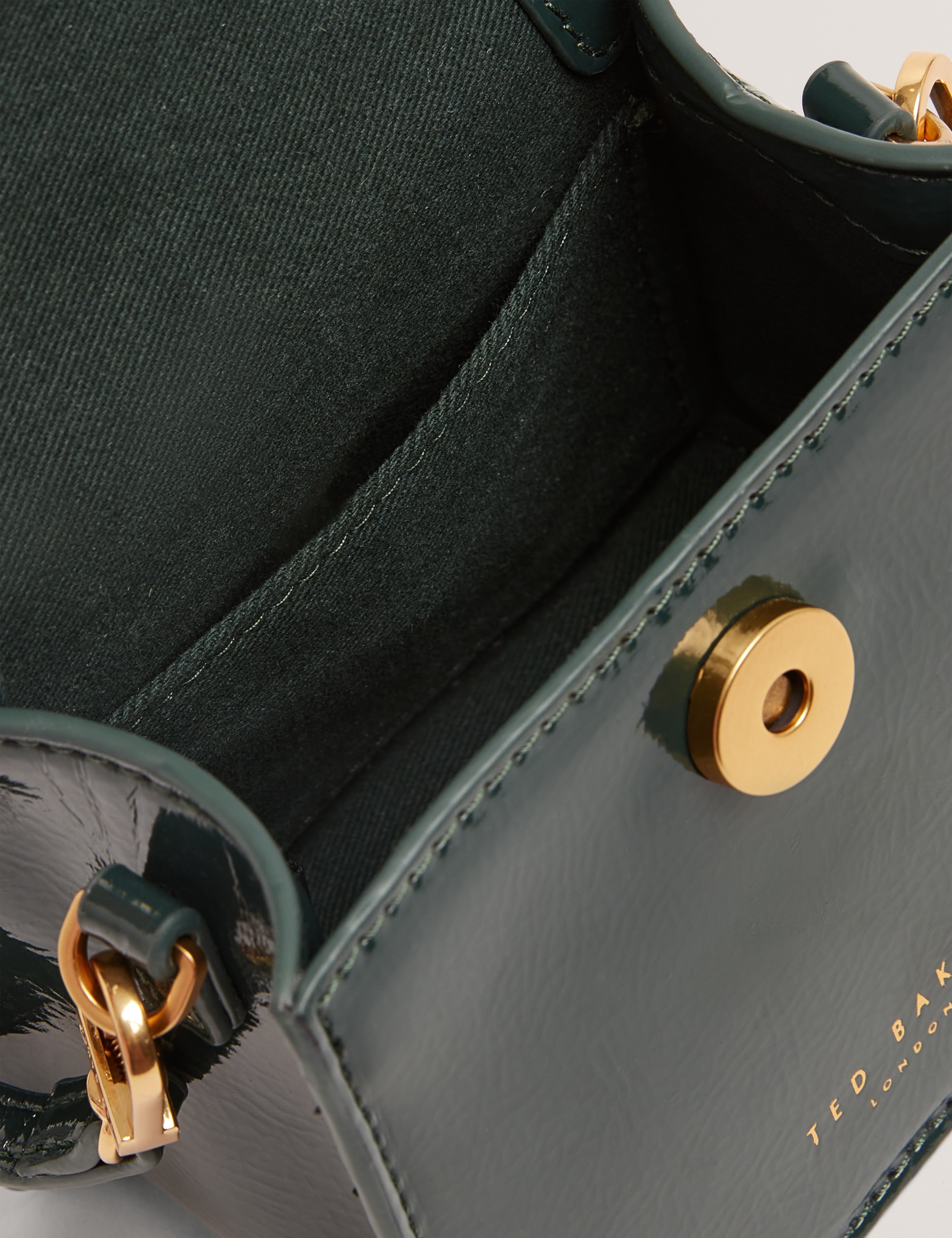 روزيلا روز حقيبة صغيرة بمقبض علوي لون أخضر داكن