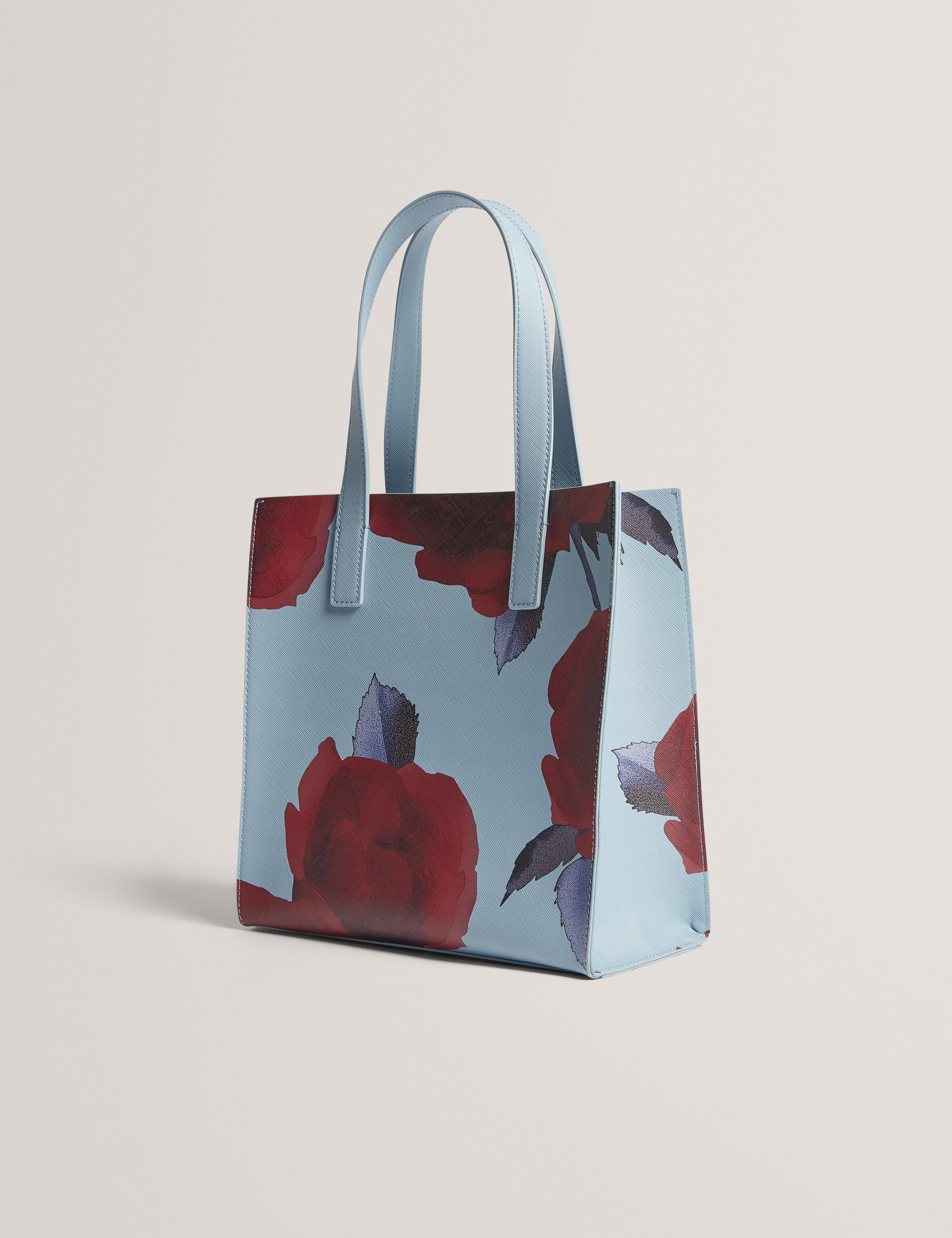 حقيبة إيميري الصغيرة ذات الطبعة الزهرية، لون أزرق متوسط.