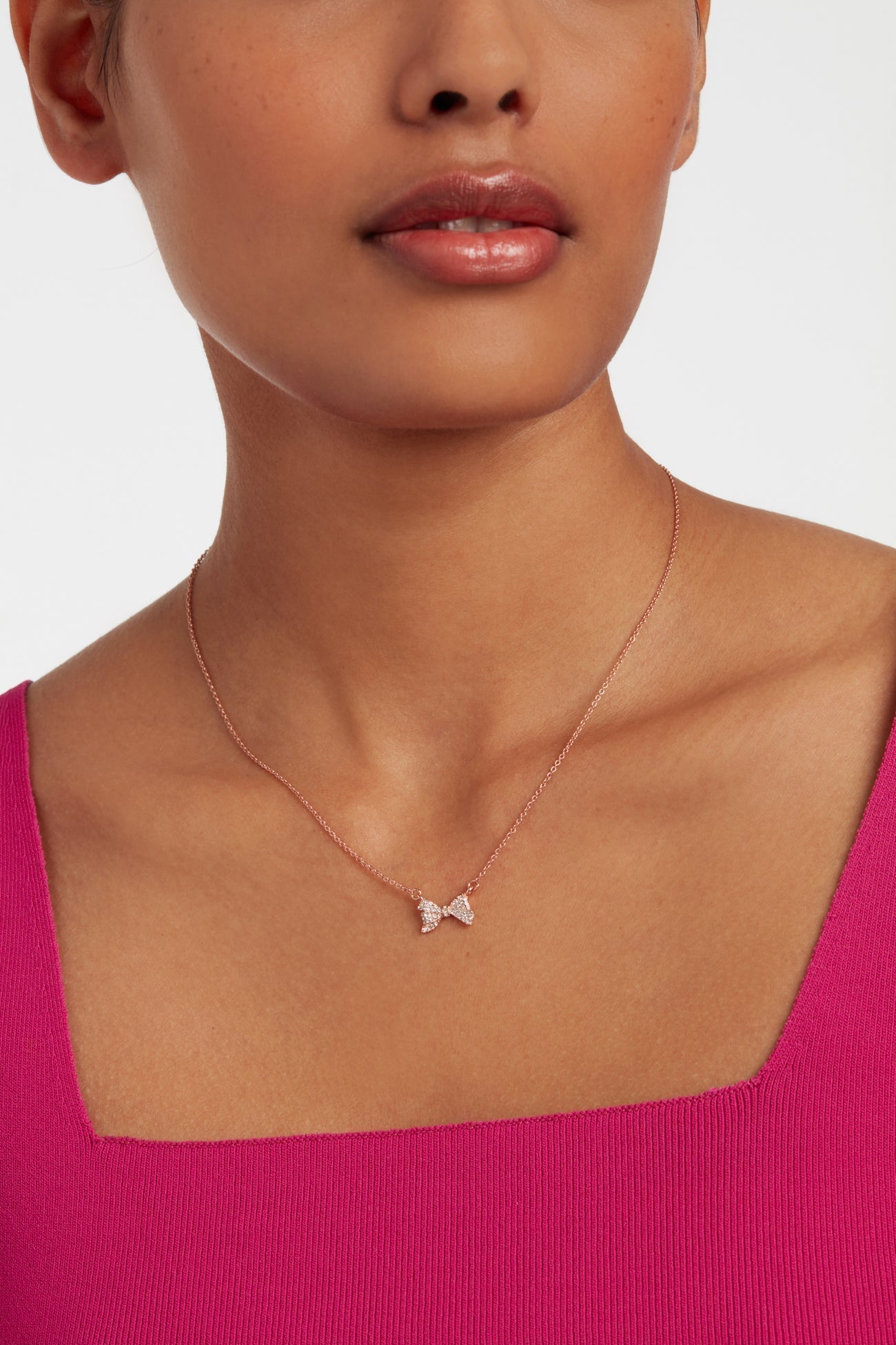 Barsie Crystal Bow Pendant Necklace Rosegd